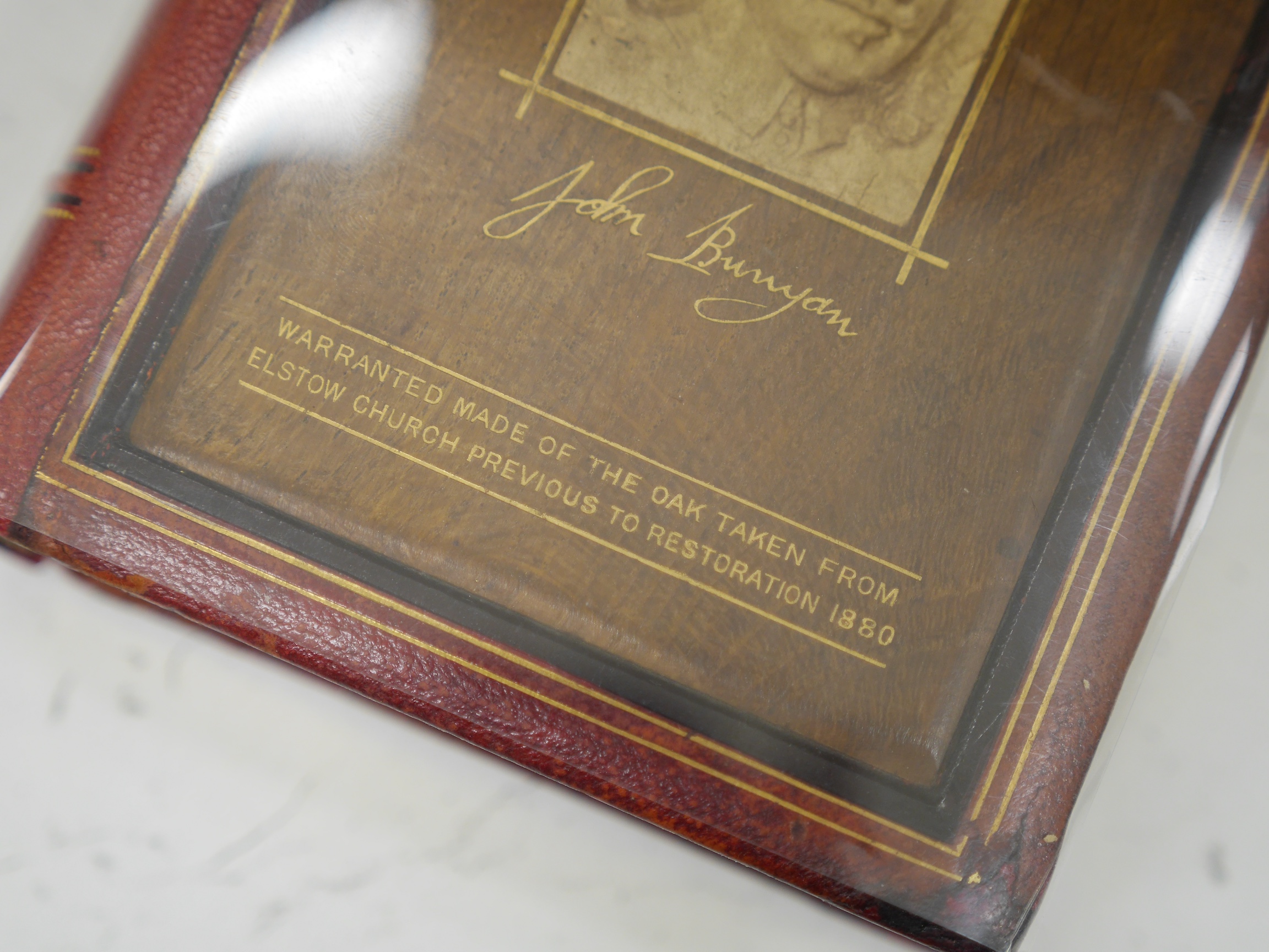 Bunyan, John, - The Pilgrim’s Progress – Elstow Edition, 1881, red morocco and oak from Elstow Church binding. Condition - paper foxed